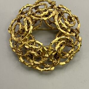 Gold Textured Brooch with Intricate Design